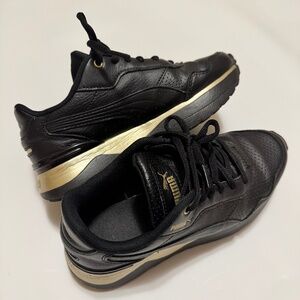PUMA Women’s Black Leather Sneakers with Gold Accents – Size 5.5